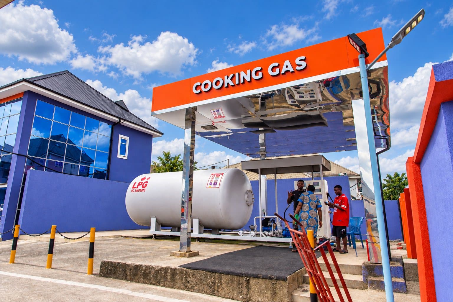 Customers at the cooking gas refill bay at Titan Ada George