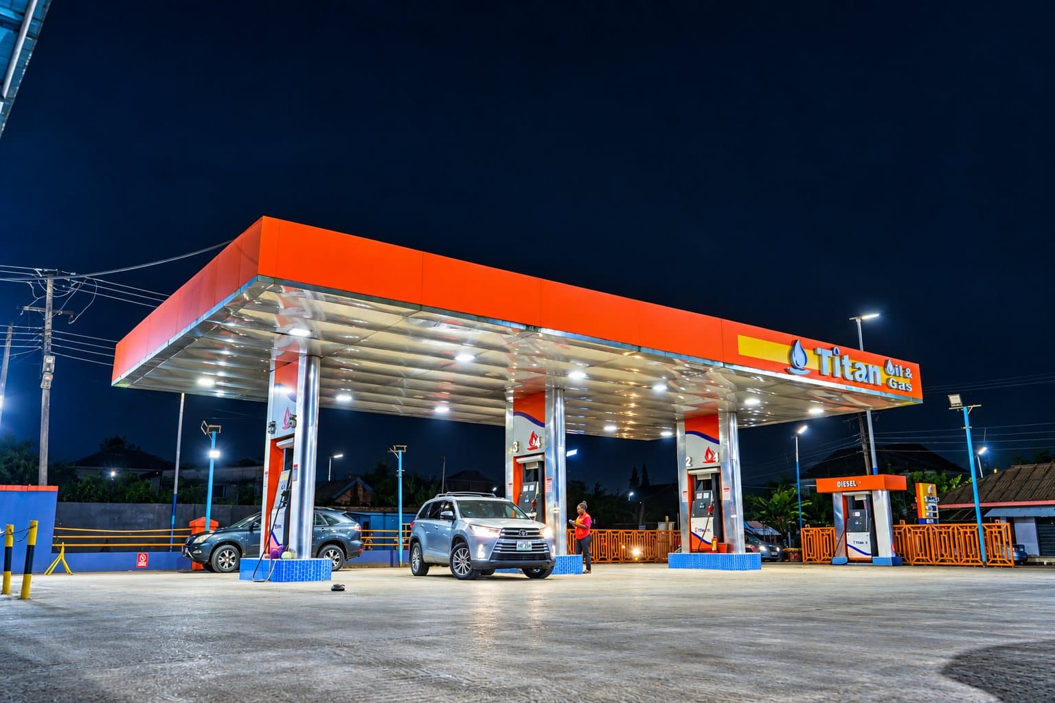 Titan Oil & Gas station at Ada George, lit up at night